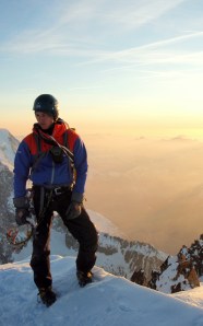Finn McCann on the summit of the Aiguille Verte.