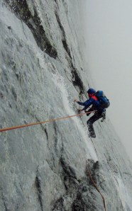Finn McCann in a storm on Piz Badile.