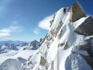Niall McCann climbing on the Cosmiques Arête.